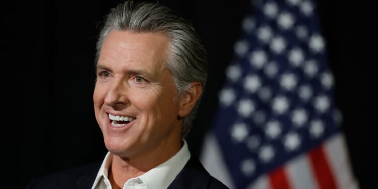 California Gov. Gavin Newsom speaks to reporters after he participated in a fireside chat at the California Economic Summit on Oct. 22, 2025, in Stockton, California.
