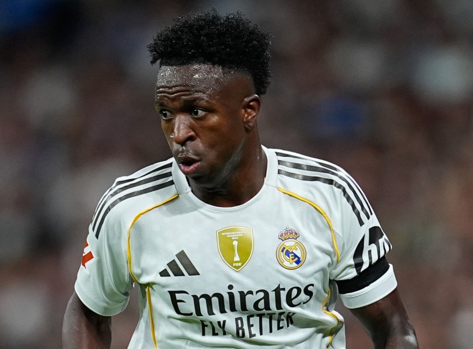 Vinicius Junior of Real Madrid CF in action with a soccer ball.
