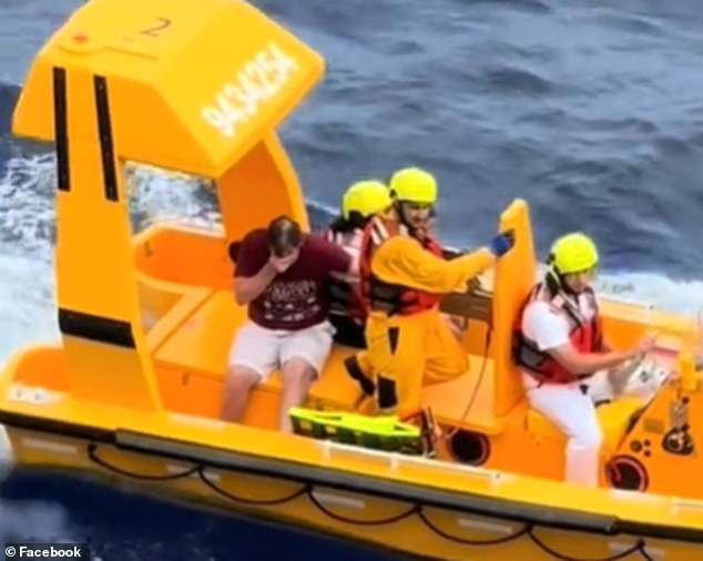 Pictured: The father of the little girl who fell overboard a Disney cruise ship recuperates on a rescue boat