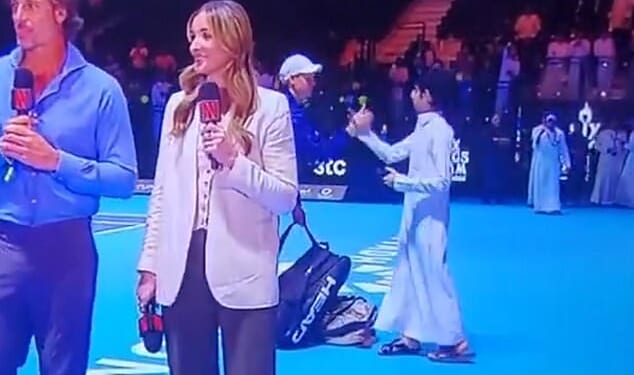 A fan made his way to Jannik Sinner on the court following his win over Stefanos Tsitsipas