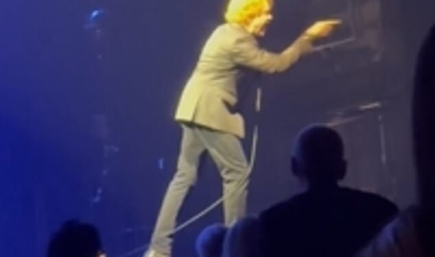 Simply Red icon Mick Hucknall launched into an extraordinary rant at a fan at his own gig at the OVO Arena Wembley on Saturday during their 40th anniversary tour