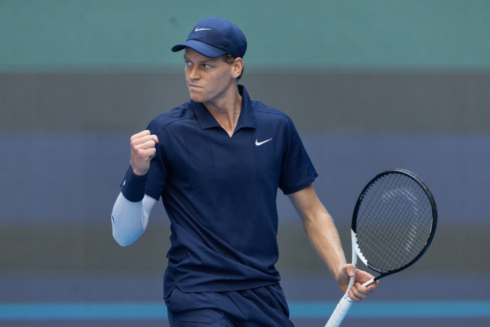 Jannik Sinner of Italy reacts during a tennis match.