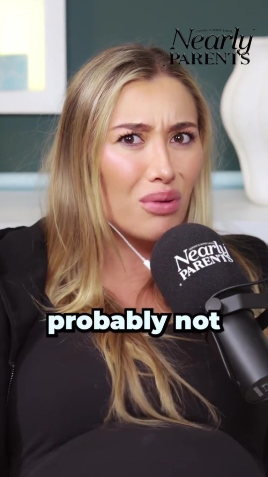 Sophie Habboo speaking into a microphone with a concerned expression.