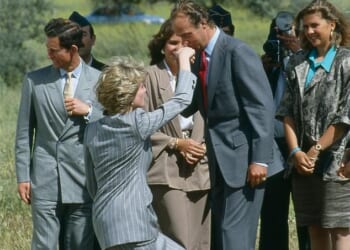 Princes Diana (pictured, left) curtseys to King Juan Carlos of Spain, who kisses her hand, as she and Prince Charles (left) leave Toledo after an official visit to Spain, April 25 1987