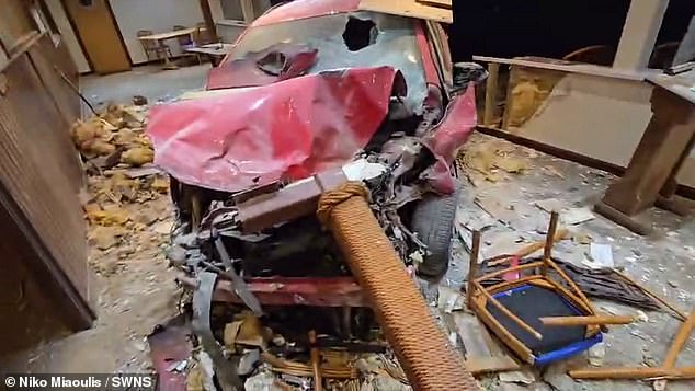 Shocking photographs show the aftermath of the crash, with the front of the dining area destroyed and the vehicle completely wrecked