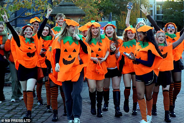 This group decided to show off their jack o'lantern costumes