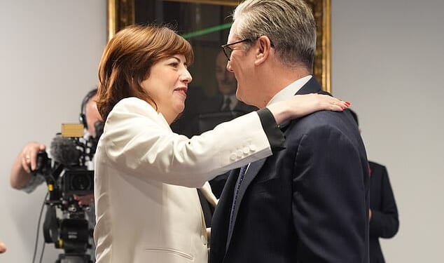 Lucy Powell (left) hugs Keir Starmer (right) after she is made the Deputy Leader of the Labour Party