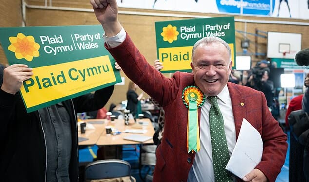 Plaid Cymru's Lindsay Whittle celebrated coming out on top in the Caerphilly by-election