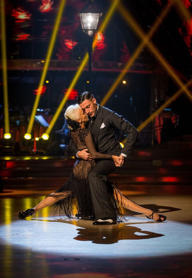 Debbie McGee and Giovanni Pernice dancing a tango during a dress rehearsal.
