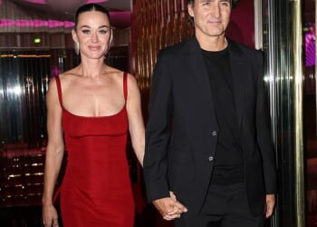 A body language expert has determined Katy Perry and Justin Trudeau were sending a message to their exes and fans during their first public date