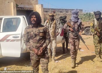 Pictured: The moment Abu Lulu - whose real name is Brigadier General Al-Fateh Abdullah Idris was arrested