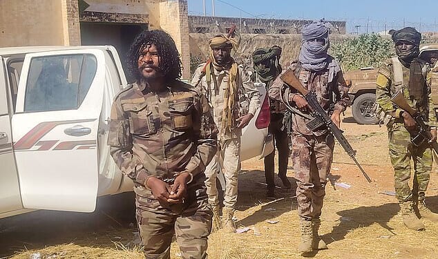 Pictured: The moment Abu Lulu - whose real name is Brigadier General Al-Fateh Abdullah Idris was arrested