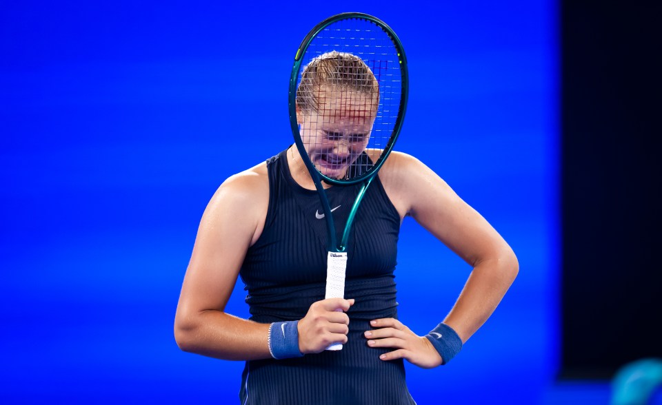 Mirra Andreeva reacts while playing against Laura Siegemund.