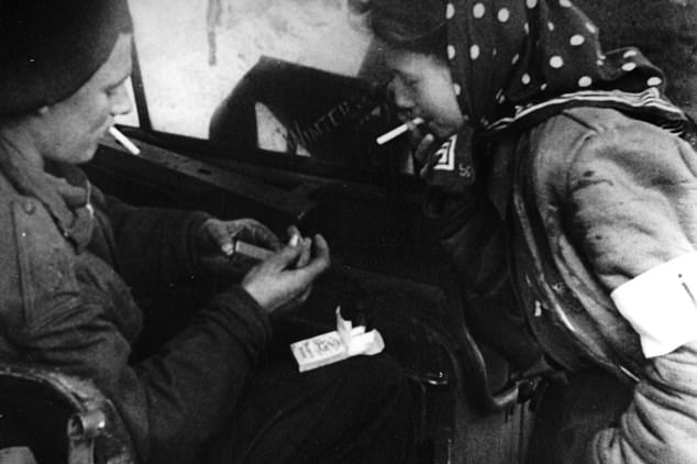 In the early 2000s, during a visit to the Imperial War Museum, Kraus spotted herself in footage of Belsen's liberation. She was seen sharing a cigarette with a British soldier