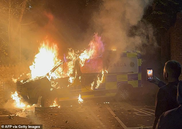 Protesters have  charged police with horse-drawn carts and three Gardaí have been hospitalised