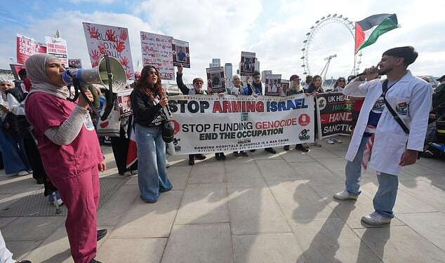 Pro-Palestine protesters are seen in central London on Saturday, a day after a peace deal was reached between Israel and Hamas