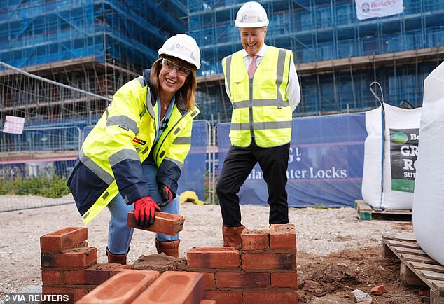 Under the plan, owners of properties worth at least £2million would face a charge of one per cent of any amount over that value. Pictured: The Chancellor on a visit to Berkeley Homes' Glasswater Locks Development in Birmingham last month