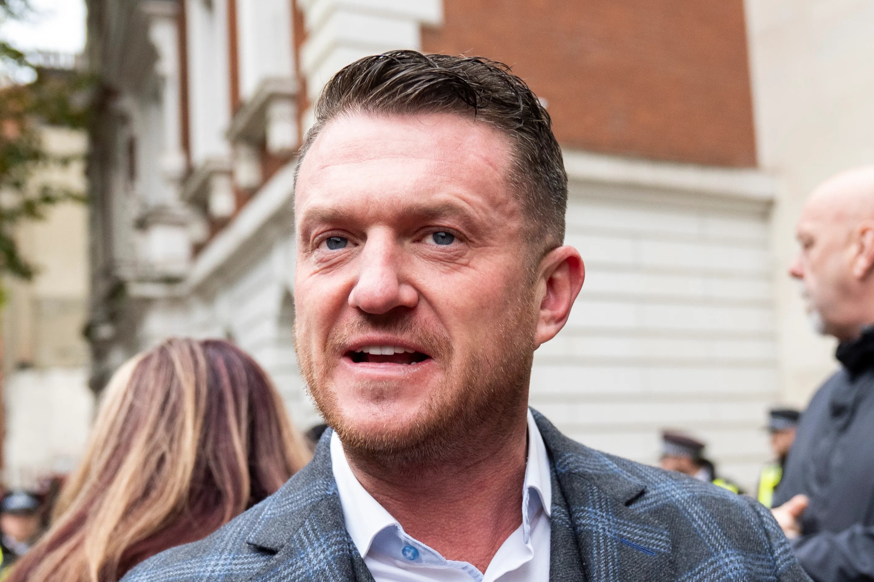 Tommy Robinson, real name Stephen Yaxley-Lennon, arrives at Westminster Magistrates' Court.
