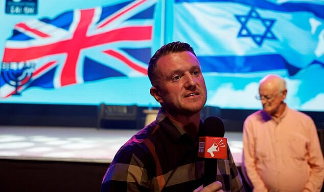 Far-right activist Tommy Robinson has addressed crowds at a rally in Tel Aviv in Israel