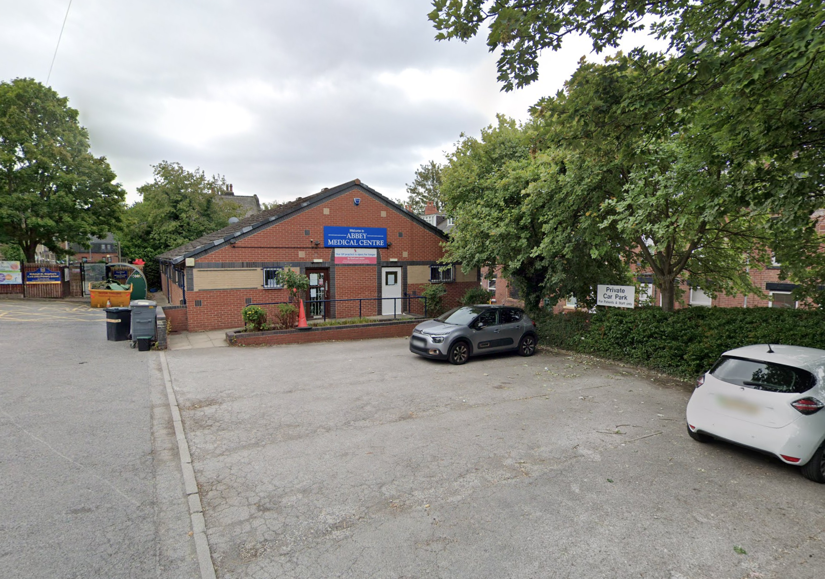 Abbey Medical Centre building with a private car park.