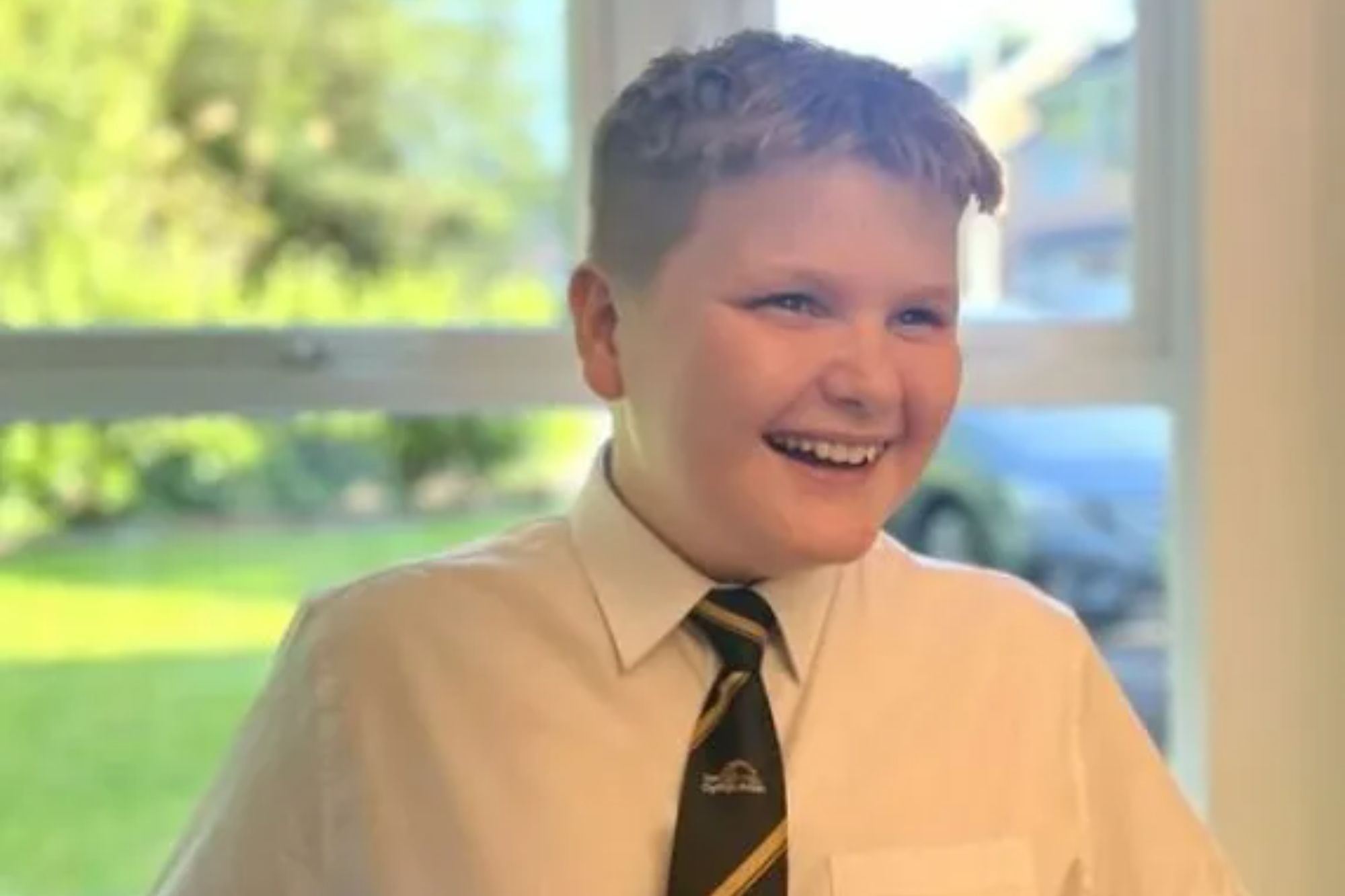 An image collage containing 1 images, Image 1 shows Harrison Angell-Chapman smiling and wearing a white shirt and striped tie