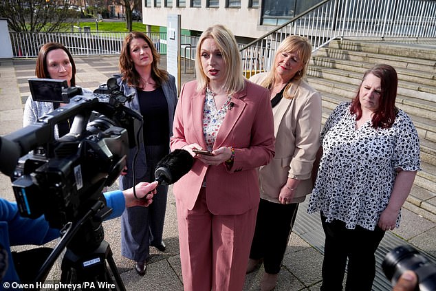Bethany Hutchison (centre, in pink) is the lead claimant of seven nurses taking on a health trust claiming sexual discrimination and sexual harassment because nurse Rose Henderson, who was born male but identifies as a woman, was able to share female changing rooms