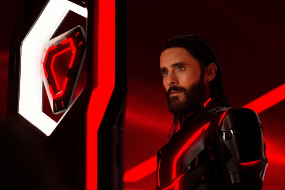 Jared Leto as an AI program in a futuristic black and red suit in Tron: Ares.