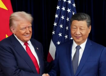 President Donald Trump and Chinese President Xi Jinping shake hands at Gimhae Air Base in Busan, South Korea on Oct. 30, 2025.