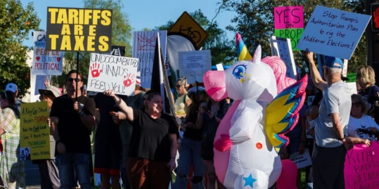 Demonstrators participate in the second "No Kings" protest Saturday in Thousand Oaks, California.