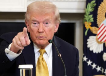 U.S. President Donald Trump points to a reporter in the State Dining Room of the White House on Oct. 23, 2025, in Washington, DC.