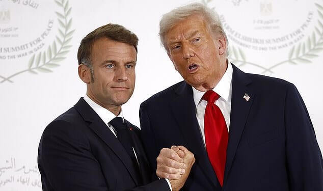 Donald Trump and Emmanuel Macron continued their ongoing handshake contest with a bizarre 'arm-wrestle' as they greeted each other at Monday's peace summit