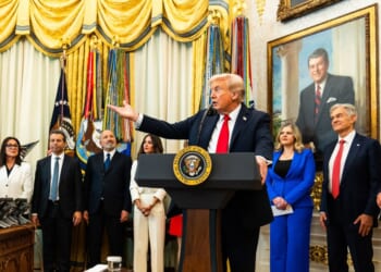 President Donald Trump answers questions from reporters during an event in the Oval Office of the White House on Thursday, Oct. 16, 2025.