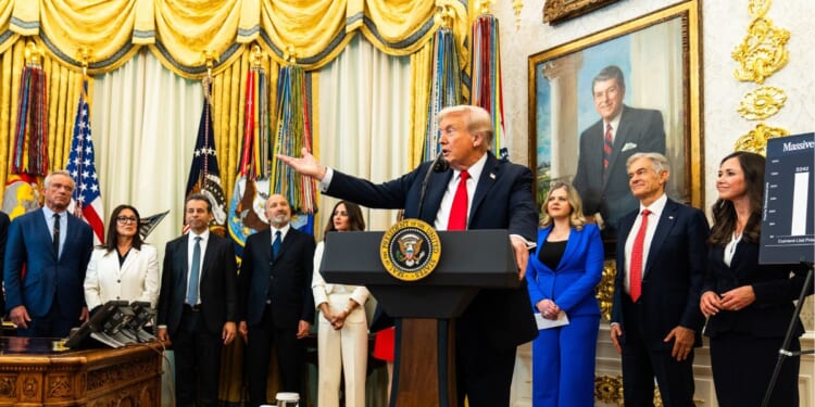 President Donald Trump answers questions from reporters during an event in the Oval Office of the White House on Thursday, Oct. 16, 2025.