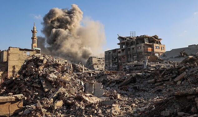 Smoke billows following an Israeli strike that targeted a building in the Bureij camp for Palestinian refugees in the central Gaza Strip on October 19, 2025