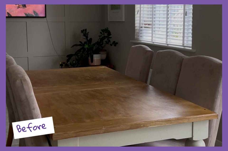 Dining room with a light wood table, four chairs, and a window with blinds.