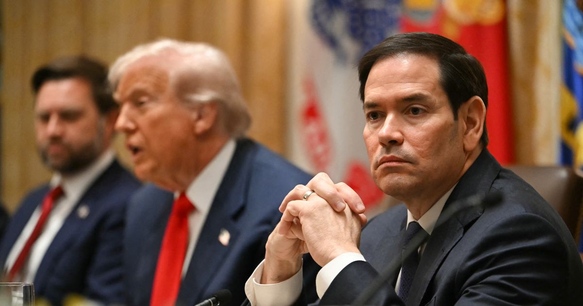 Secretary of State Marco Rubio looks on as President Donald Trump meets with Argentina's President Javier Milei in the Cabinet Room at the White House in Washington, D.C., on Oct. 14, 2025.
