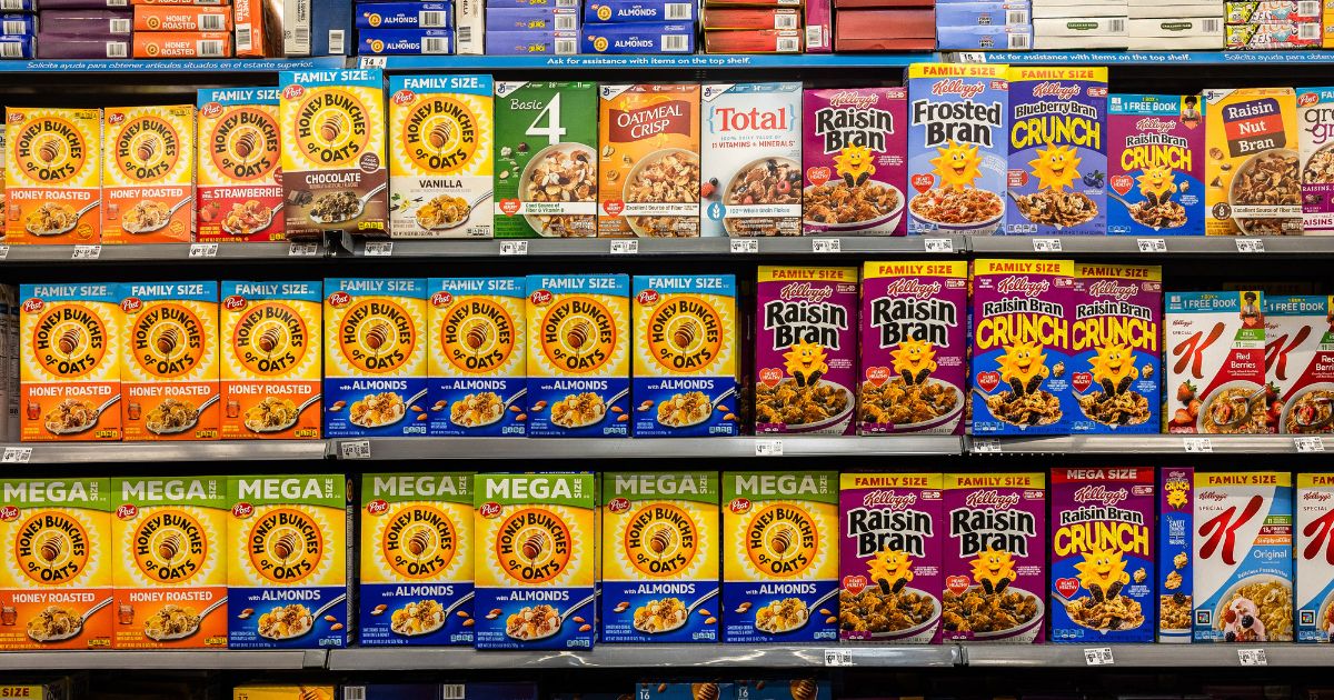 Boxes of cereal from several brands, including Honey Bunches and Kelloggs, on the shelves of a Walmart store in Florida City, Florida, on Aug. 5, 2025.