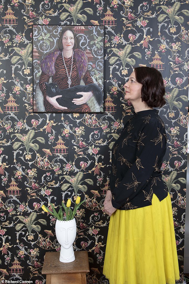 Liz Hoggard (pictured) was forced to shell out hundreds of pounds on basic necessities for her black and white rescue cat Freddie