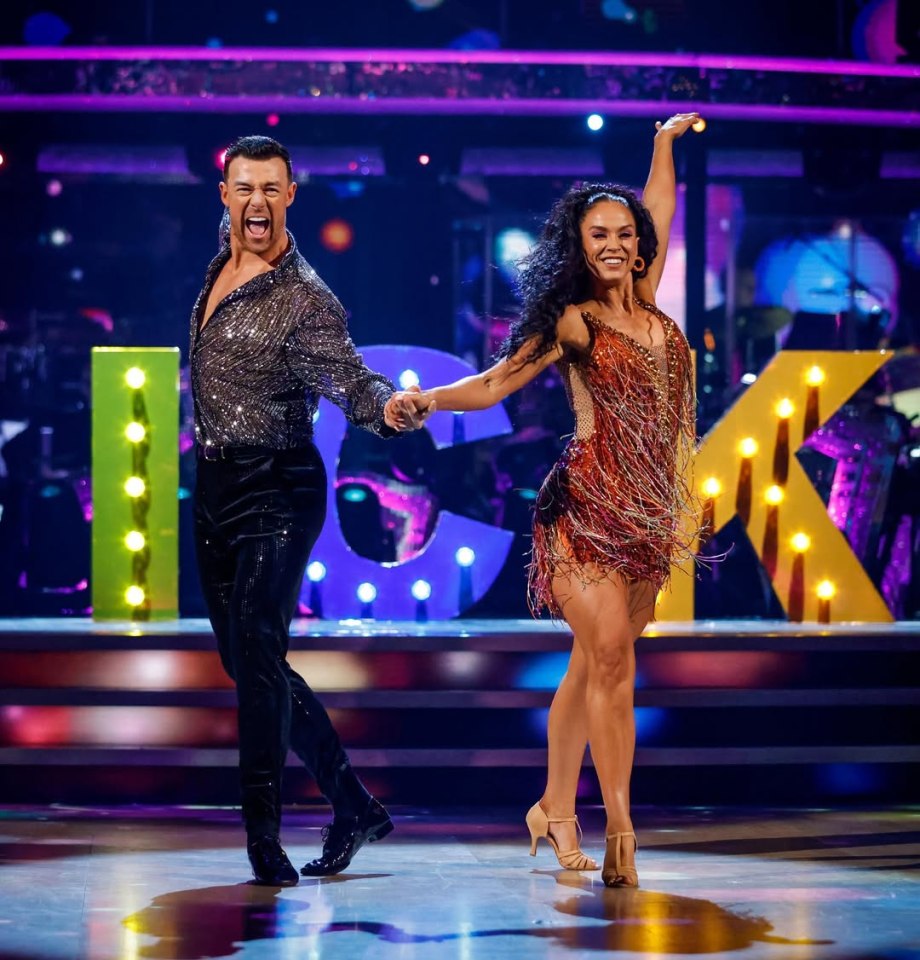 Ercan Ramadan and Vicky Pattison dancing on stage.
