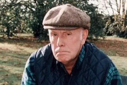 Richard Wilson as Victor Meldrew on a riding lawnmower.