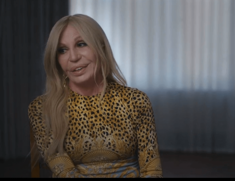 Donatella Versace in a leopard print dress.