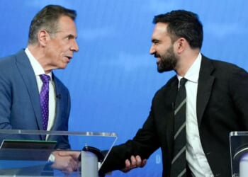 New York City mayoral candidates - independent Andrew Cuomo, left, and Democrat Zohran Mamdani, right - shake hands before the start of the debate in New York City on Oct. 16.