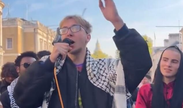 An Oxford student (pictured) has been filmed chanting ‘horrifying’ anti-Israeli lyrics to crowds in London, prompting a police investigation