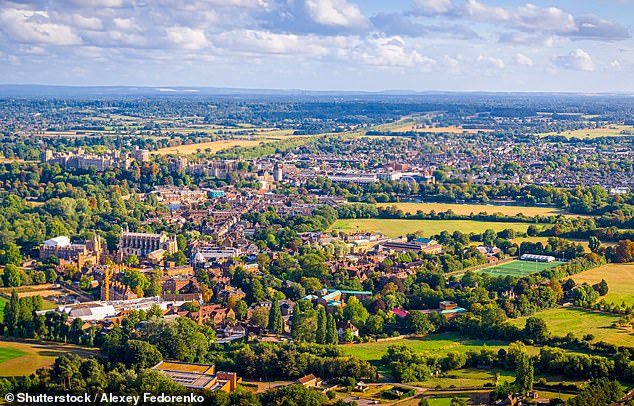 Town and country: If you want to be surrounded by green space, consider house hunting in Windsor (pictured) where households have an average of 7,102.5 acres within 1km