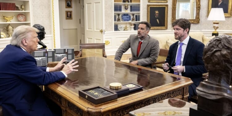 Buck Sexton, right, sits down for a meeting with President Donald Trump, left, at the White House in Washington, D.C.