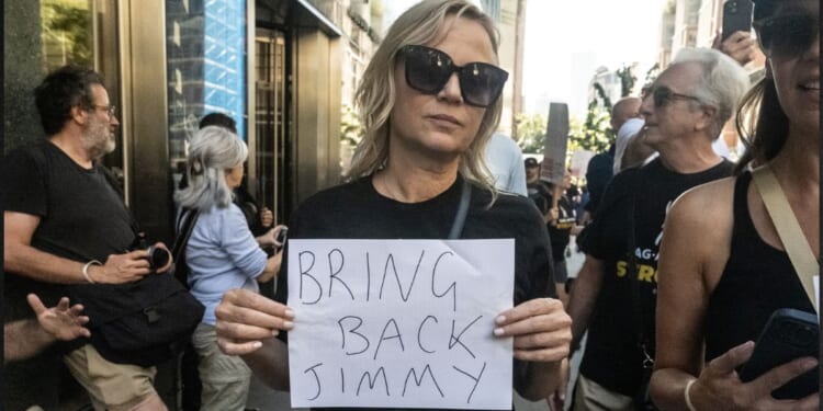 Fans of late-night host Jimmy Kimmel participate in a protest against ABC's decision to suspend Jimmy Kimmel from his show on Sept. 19 in New York City. ABC suspended Kimmel over comments he made about Charlie Kirk's shooting.