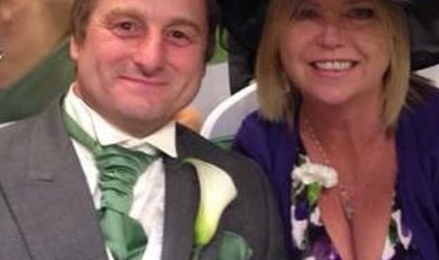 Kevin Holding (left) with his partner Katrine Woods who is suing his employer after he was crushed to death by a pop up toilet