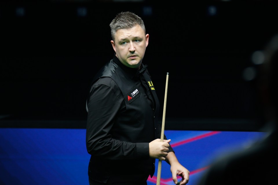 Kyren Wilson of England reacting during a semifinal snooker match.