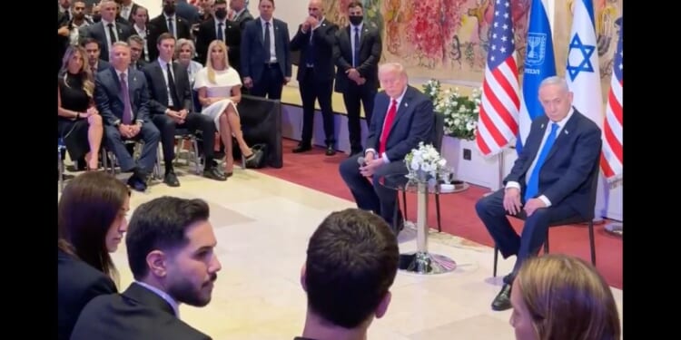President Donald Trump listens to the families of the hostages of Hamas after he helped ensure the return of those still living via a peace deal on Oct. 13, 2025.