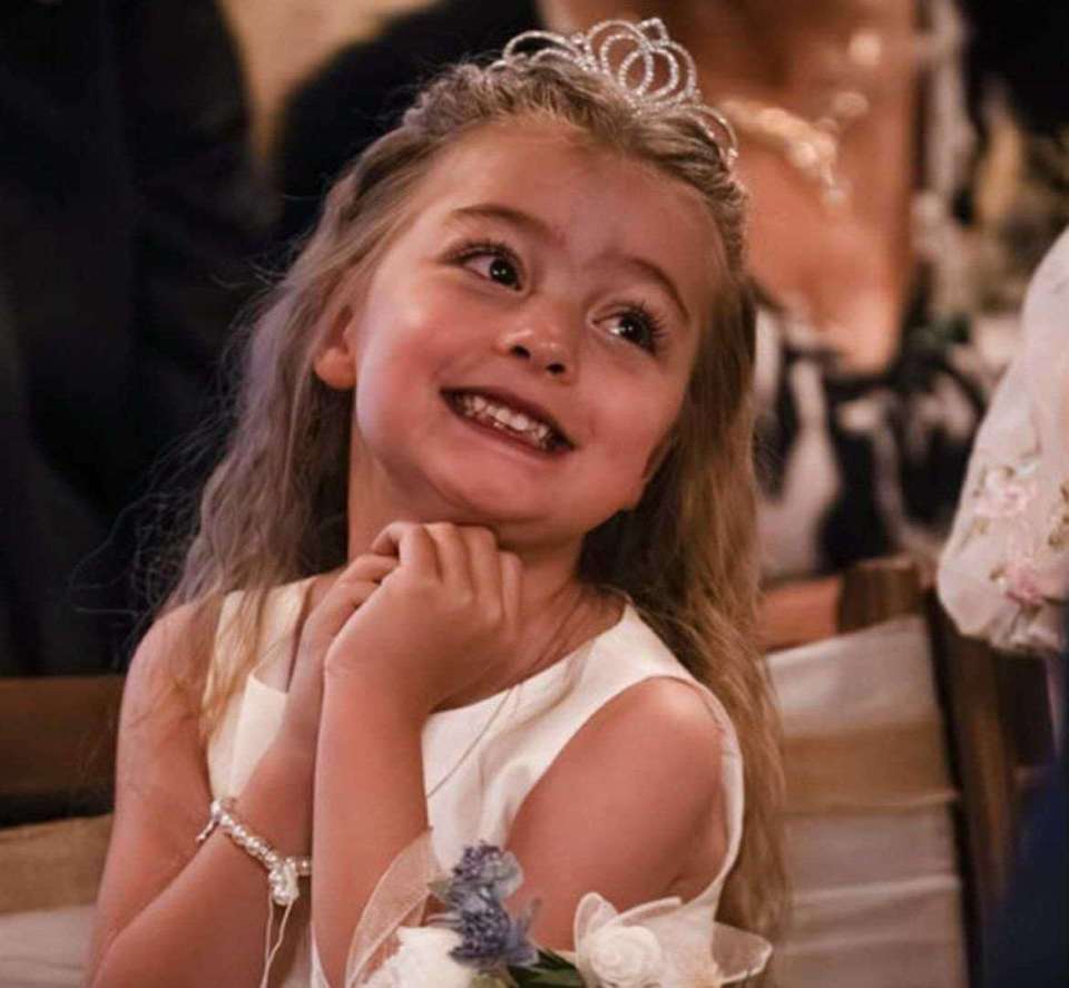 Luna Ivy Webster, a five-year-old girl with Hypoplastic Left Heart Syndrome, smiling and wearing a tiara.